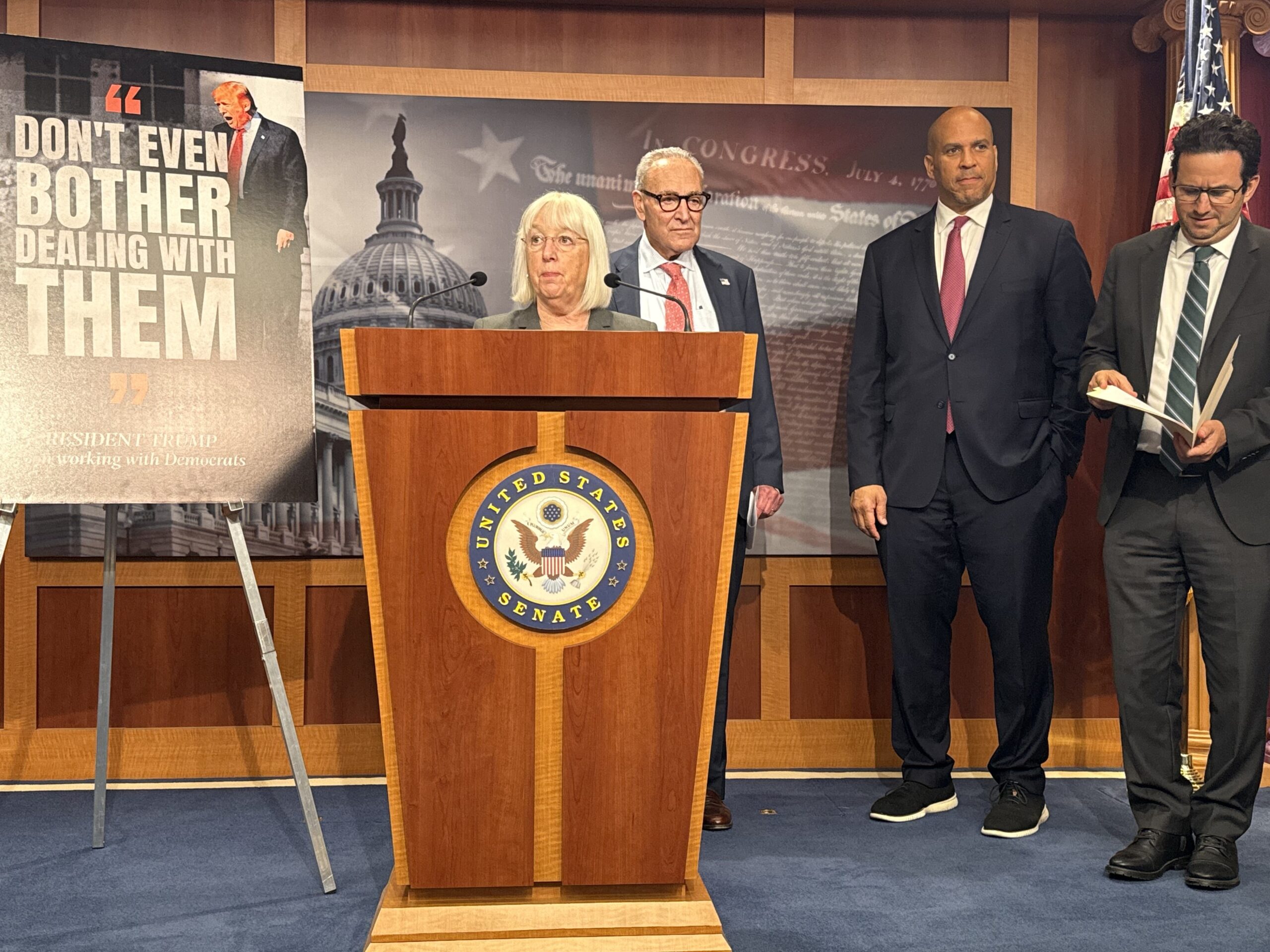 Washington state Democratic U.S. Sen. Patty Murray speaks with reporters inside the Capitol building in Washington, D.C., on Friday, Sept. 19, 2025. Also pictured, from left to right, are Senate Minority Leader Chuck Schumer, D-N.Y., New Jersey Democratic Sen. Cory Booker and Hawaii Democratic Sen. Brian Schatz. (Photo by Jennifer Shutt/States Newsroom)