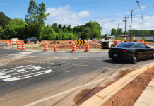 A new roundabout has opened at this busy intersection in Flowery Branch