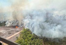 Fast-growing wildfire tops 31 square miles, more evacuations possible