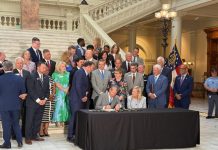 Kemp signs legislation to cut income taxes and reduce homeowner property tax increases