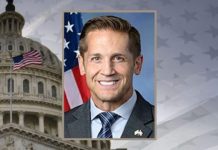 Hall congressman hosts town hall meeting amid tight security