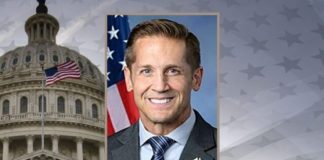 Hall congressman hosts town hall meeting amid tight security
